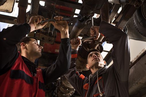 ASE Master-Certified Technician in auto repair service uniform in Taylorsville, MD.
