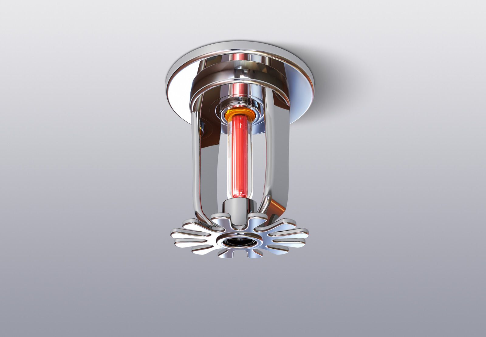A fire sprinkler with a red light coming out of it