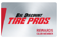 Big Discount Tire Pros rewards card, silver with red and black logo, says 