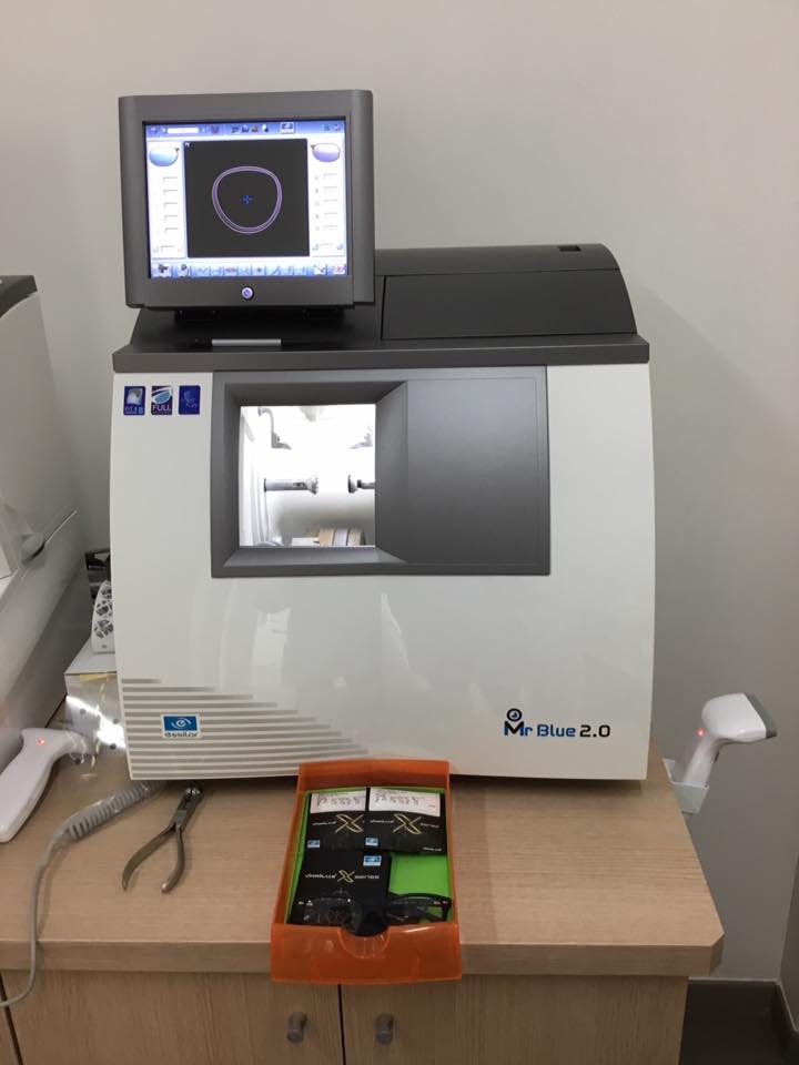 macchina per taglio e assemblaggio lenti