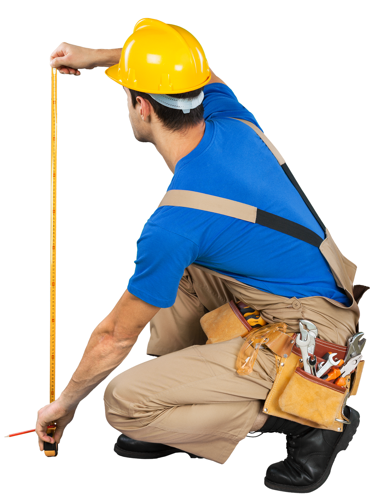 Construction worker measuring with a ruler, wearing a yellow hard hat and tool belt.