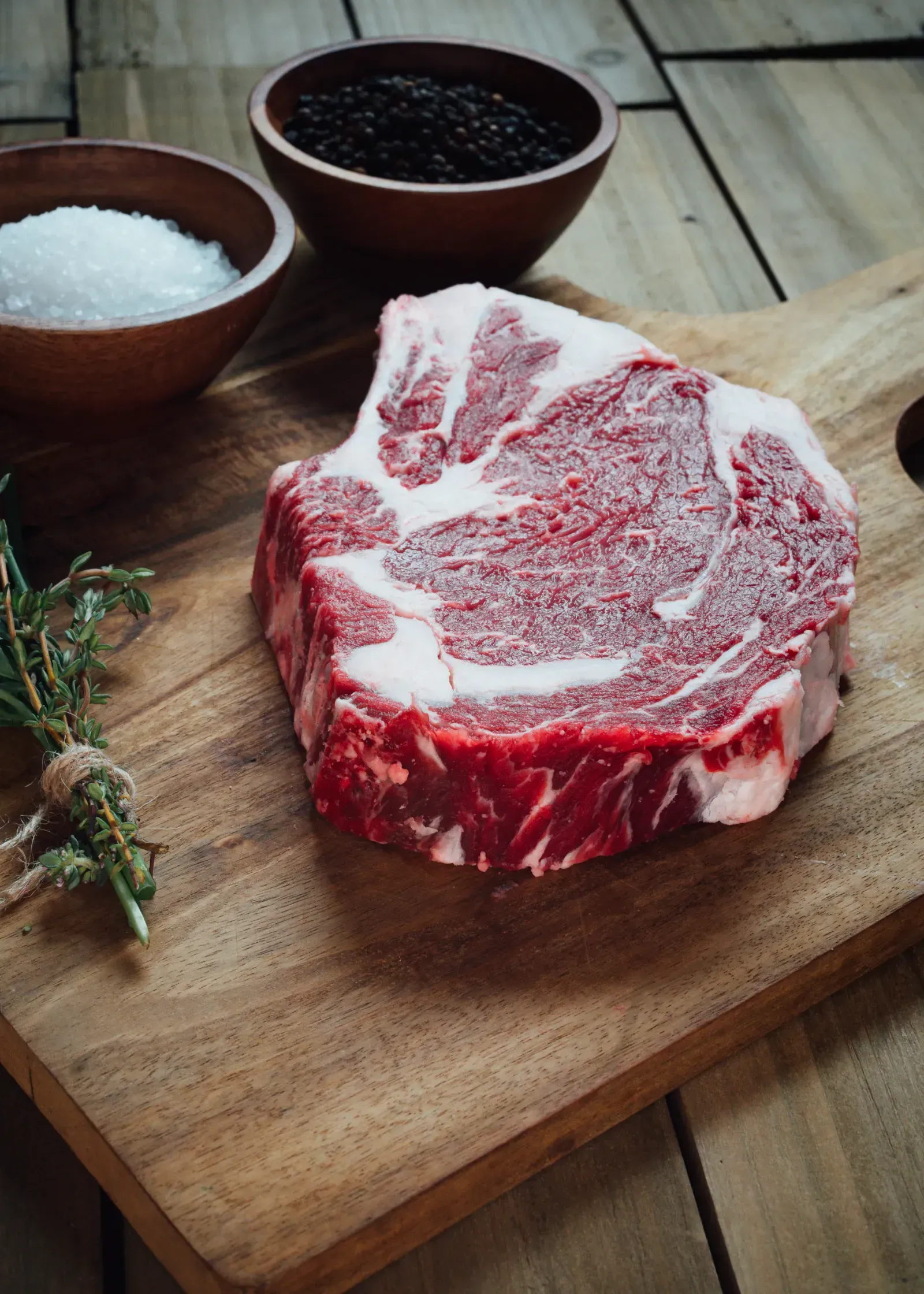 Fresh USDA-quality beef cut displayed with rustic ranch styling.