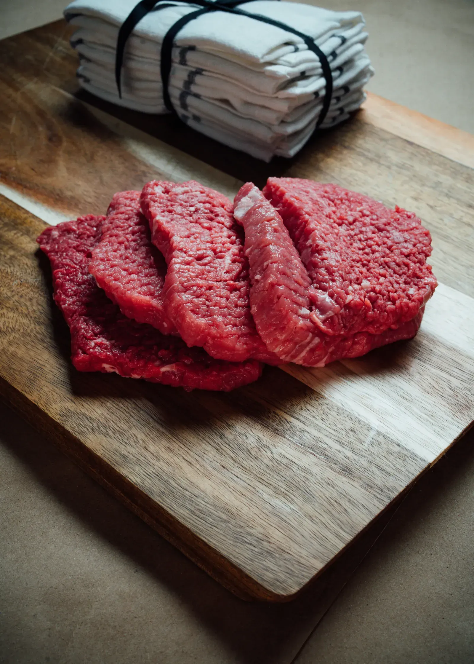 Close-up ribeye steak with bone from Texas-raised Angus cattle.
