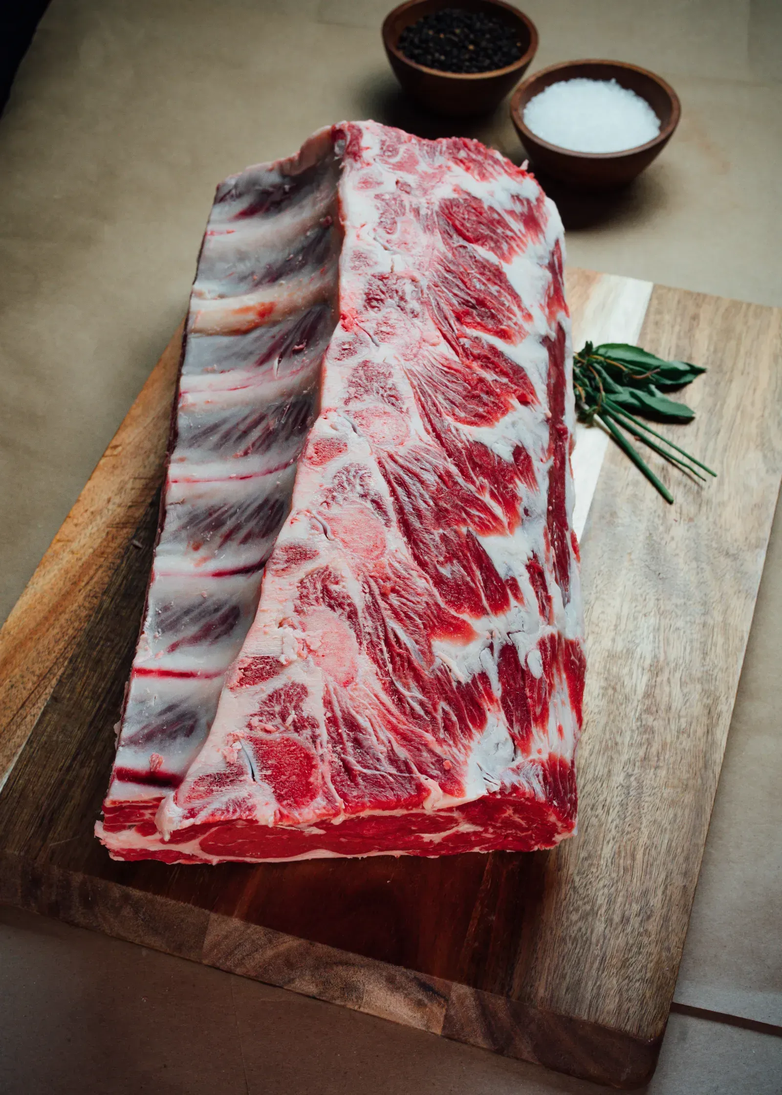 Farm-to-table Angus beef marbled cut sourced from Thomas Cattle & Catering.