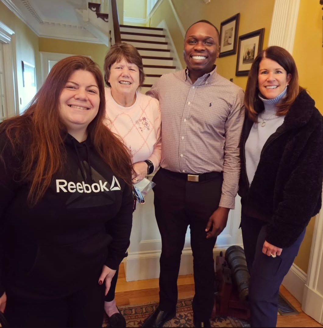 Two people holding a 