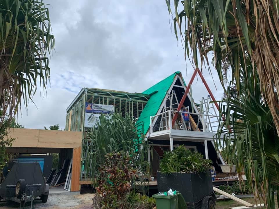 Construction of a House With a Triangular Roof — Over the Top Roofing Specialists in Caloundra, QLD