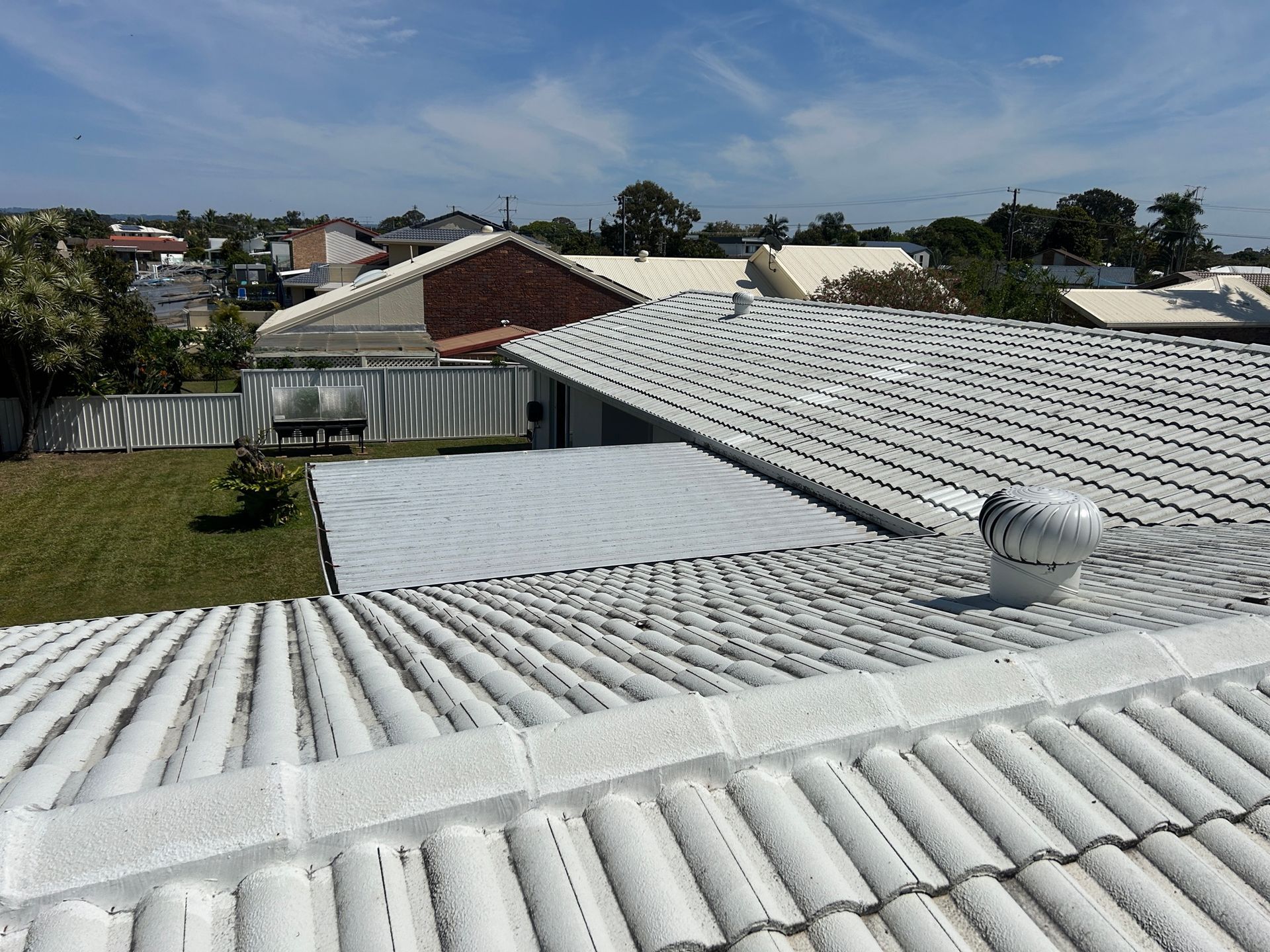 White Tiled Roof With a Rooftop Air Vent — Over the Top Roofing Specialists in Kunda Park, QLD