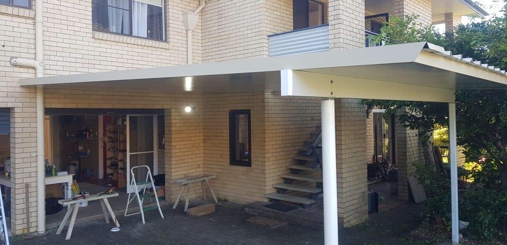 Exterior View of a Carport Attached to a Brick Building — Over the Top Roofing Specialists in Buderim, QLD