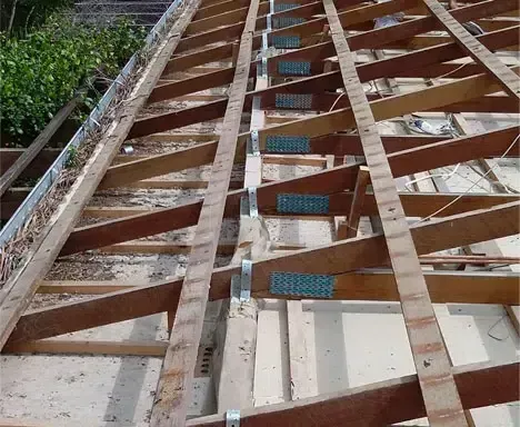 Wooden Roof Rafters and Supports, Fastened With Metal Brackets — Over the Top Roofing Specialists in Kunda Park, QLD