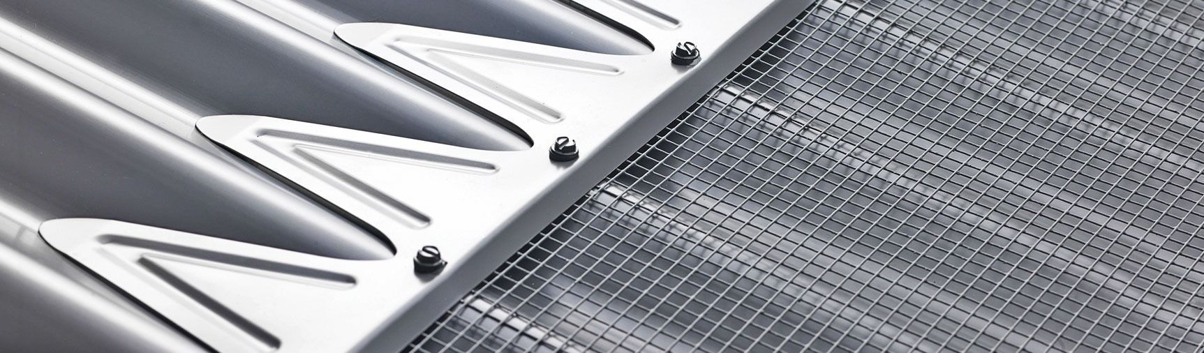 Close-up View of Two Metal Surfaces — Over the Top Roofing Specialists in Kunda Park, QLD