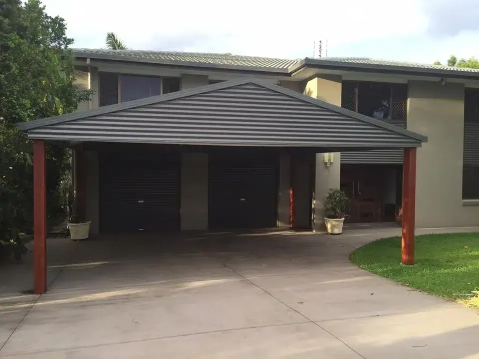 Carport Attached to a Two-story House, Dark Gray Roof — Over the Top Roofing Specialists in Kallangur, QLD