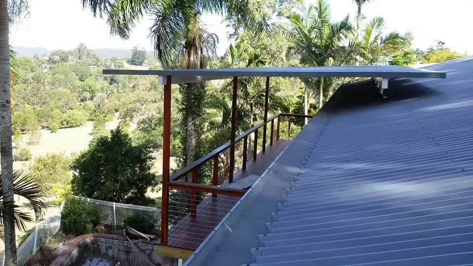 View of a Deck With a Roof Over It, Overlooking Trees — Over the Top Roofing Specialists in Narangba, QLD