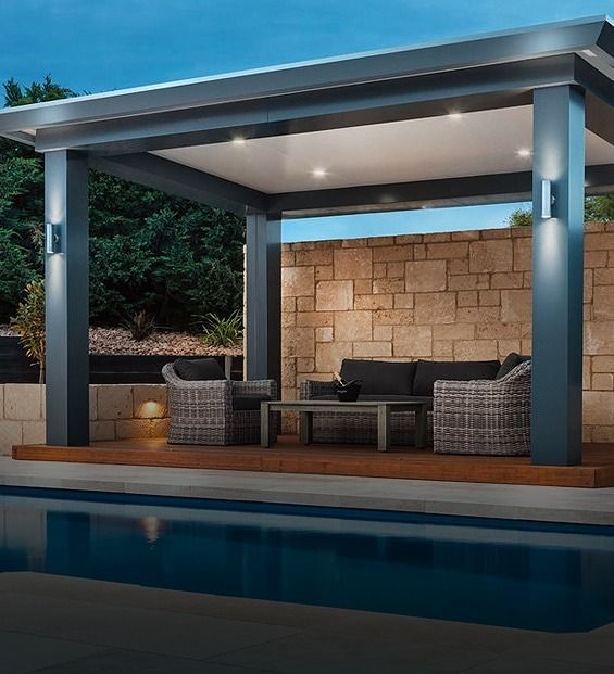 Outdoor Patio With Seating Area, Adjacent to a Pool — Over the Top Roofing Specialists in Kunda Park, QLD