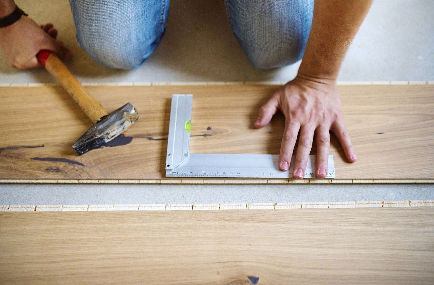 Delta handyman services installing laminate flooring