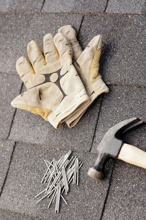Delta Handyman Nails, Gloves and Hammer on New Roofing