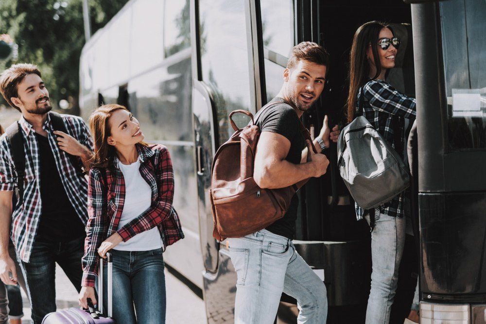 People Boarding on Travel Bus — Coach Trips in Lismore, NSW