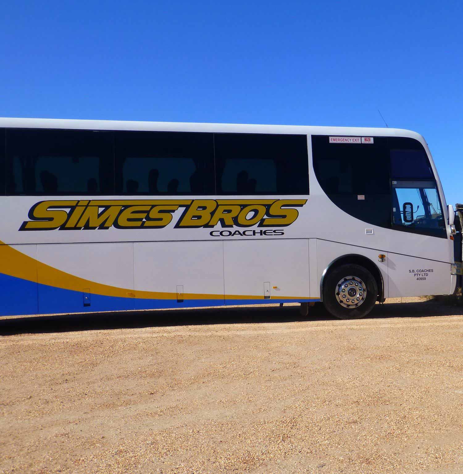 Side View of Simes Bros Coaches — Coach Trips in Lismore, NSW