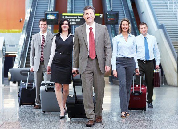 Group of Business Person at the International Airport — Coaches Near Me in Australia