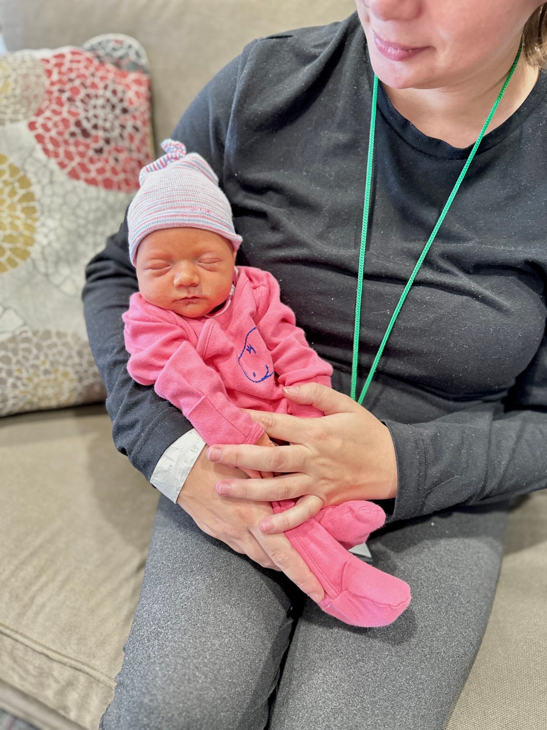 Baby being held at Ronald McDonald House