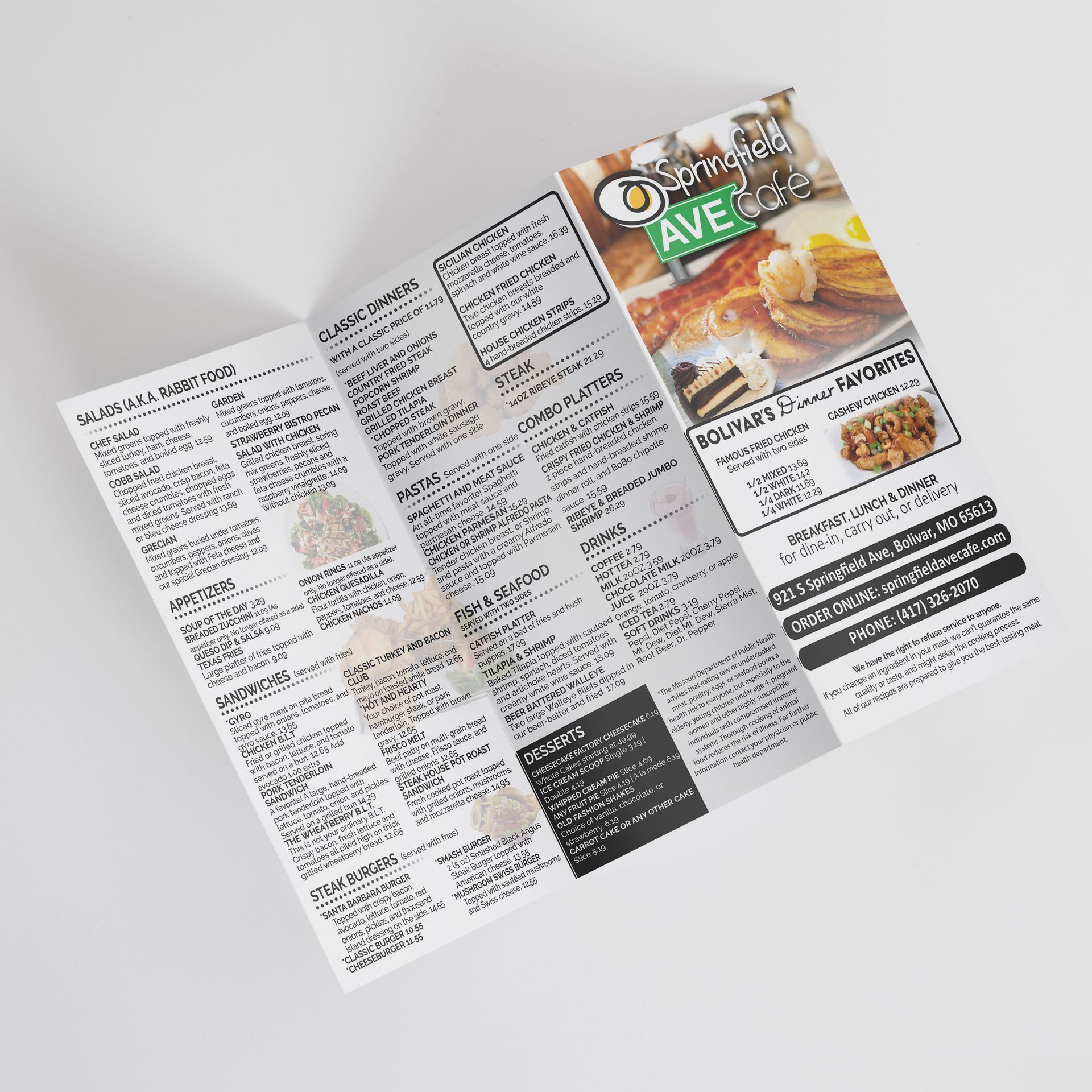 A menu for a restaurant is sitting on a table.