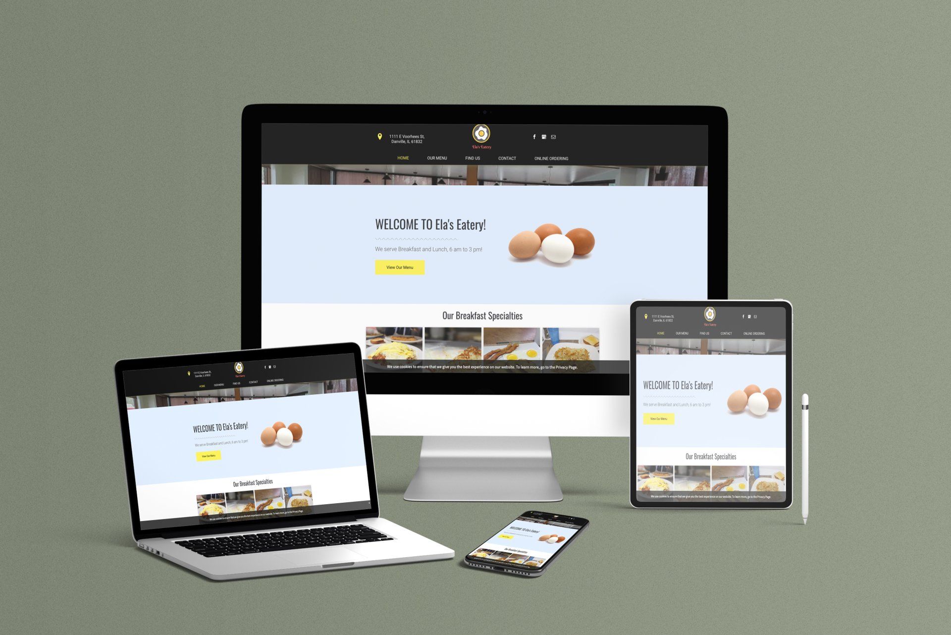 A computer , laptop , tablet and phone are sitting on a table.