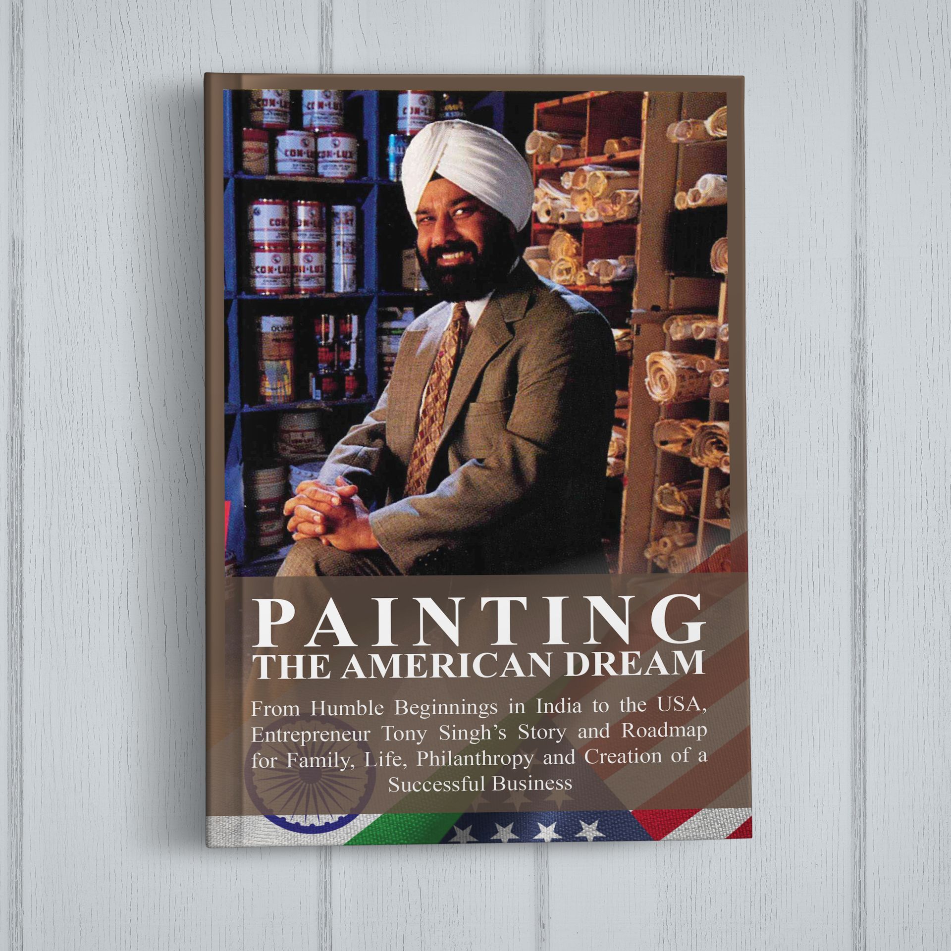 A book titled painting the american dream has a man in a turban on the cover
