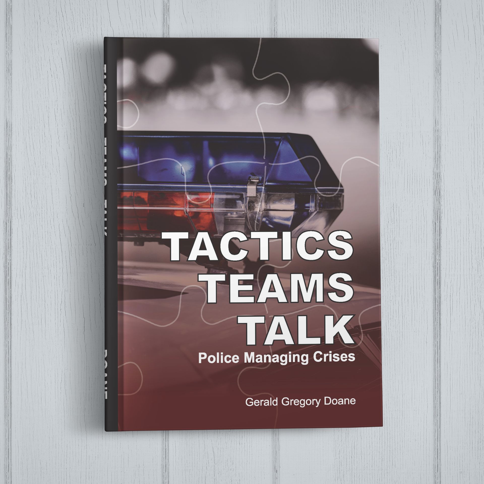 A book titled tactics teams talk police managing crises