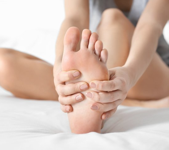 Woman Stretching Foot