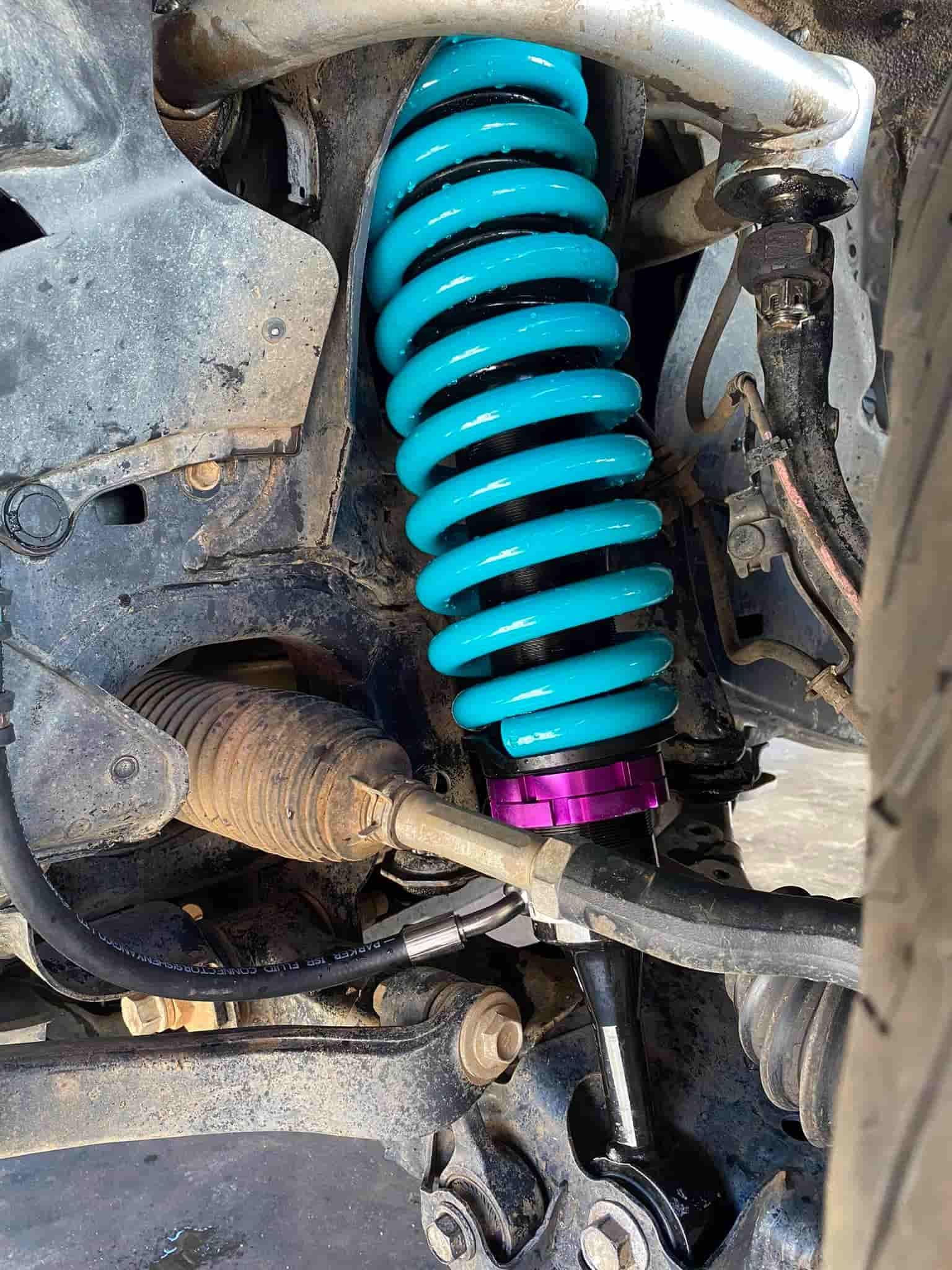 A Close Up of a Shock Absorber on a Car — RK Diesel Services in Golden Grove, SA