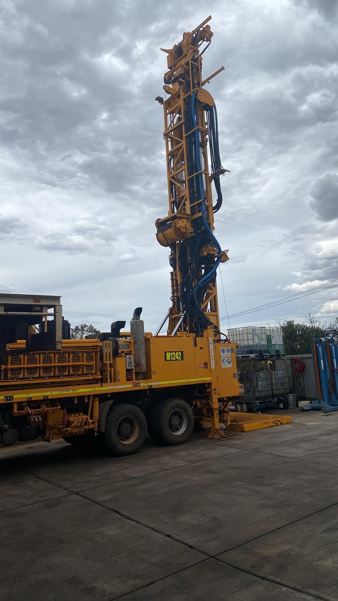 A Large Yellow Truck is Parked in a Parking Lot — RK Diesel Services in Ciccone, NT