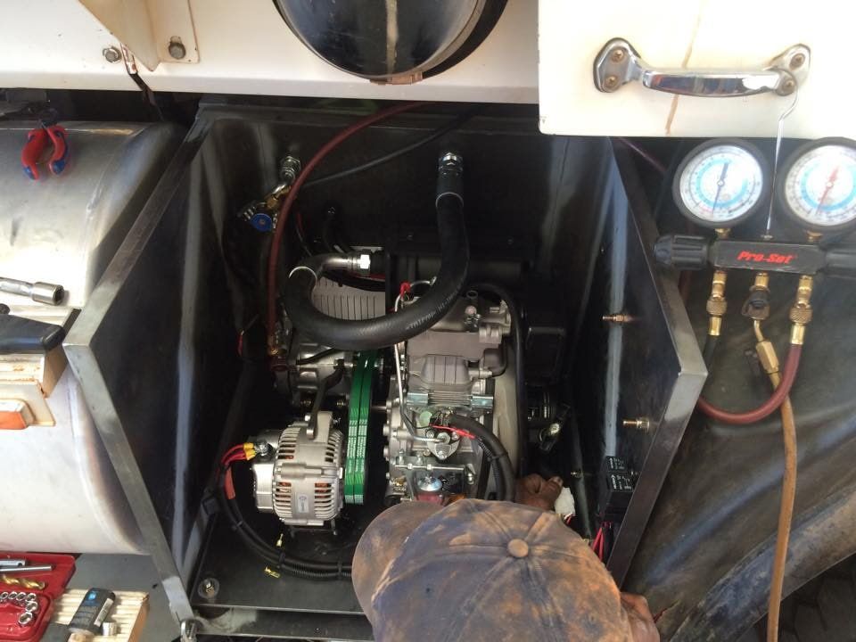A Man is Working on an Air Conditioning System in a Car — RK Diesel Services in Nuriootpa, SA