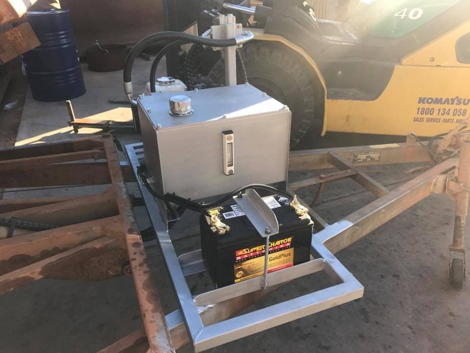 A Forklift is Parked Next to a Hydraulic Tank — RK Diesel Services in Two Wells, SA