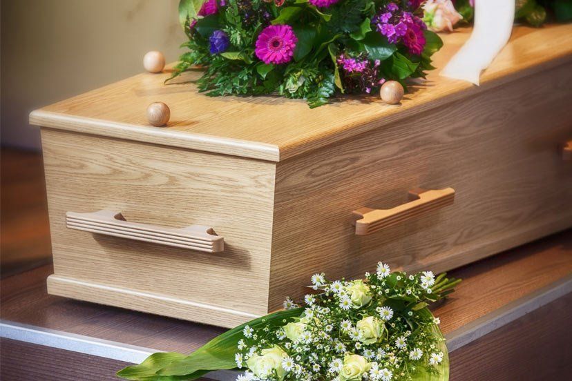 flowers and coffin