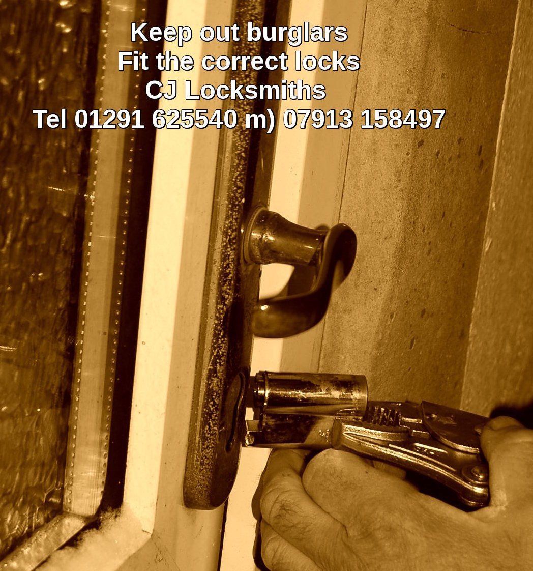 cj locksmiths burglar photograph