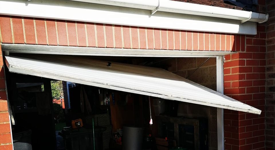 Paul Easton Garage door repairs garage door broken cables