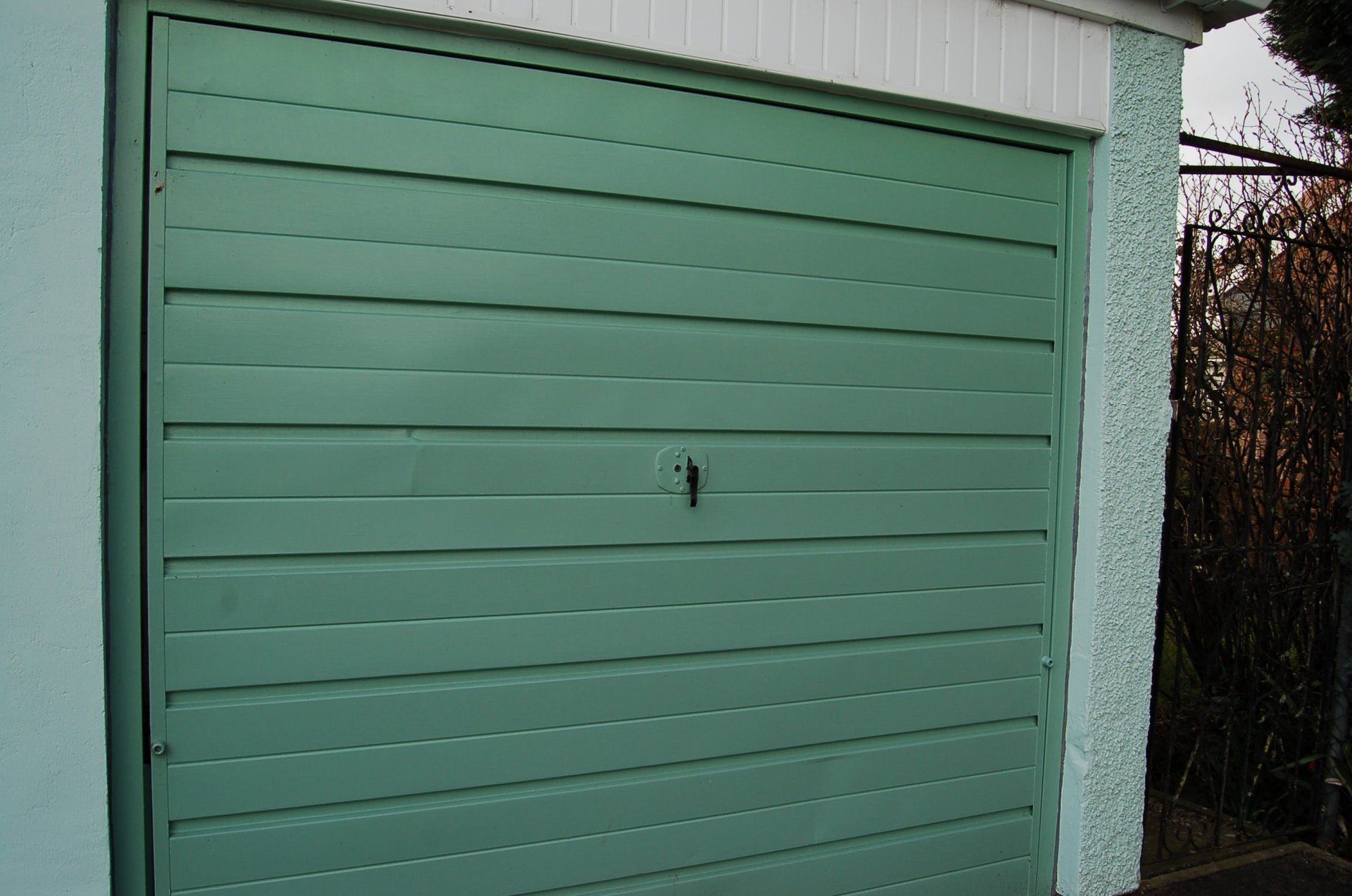 Old garage doors serviced and repaired