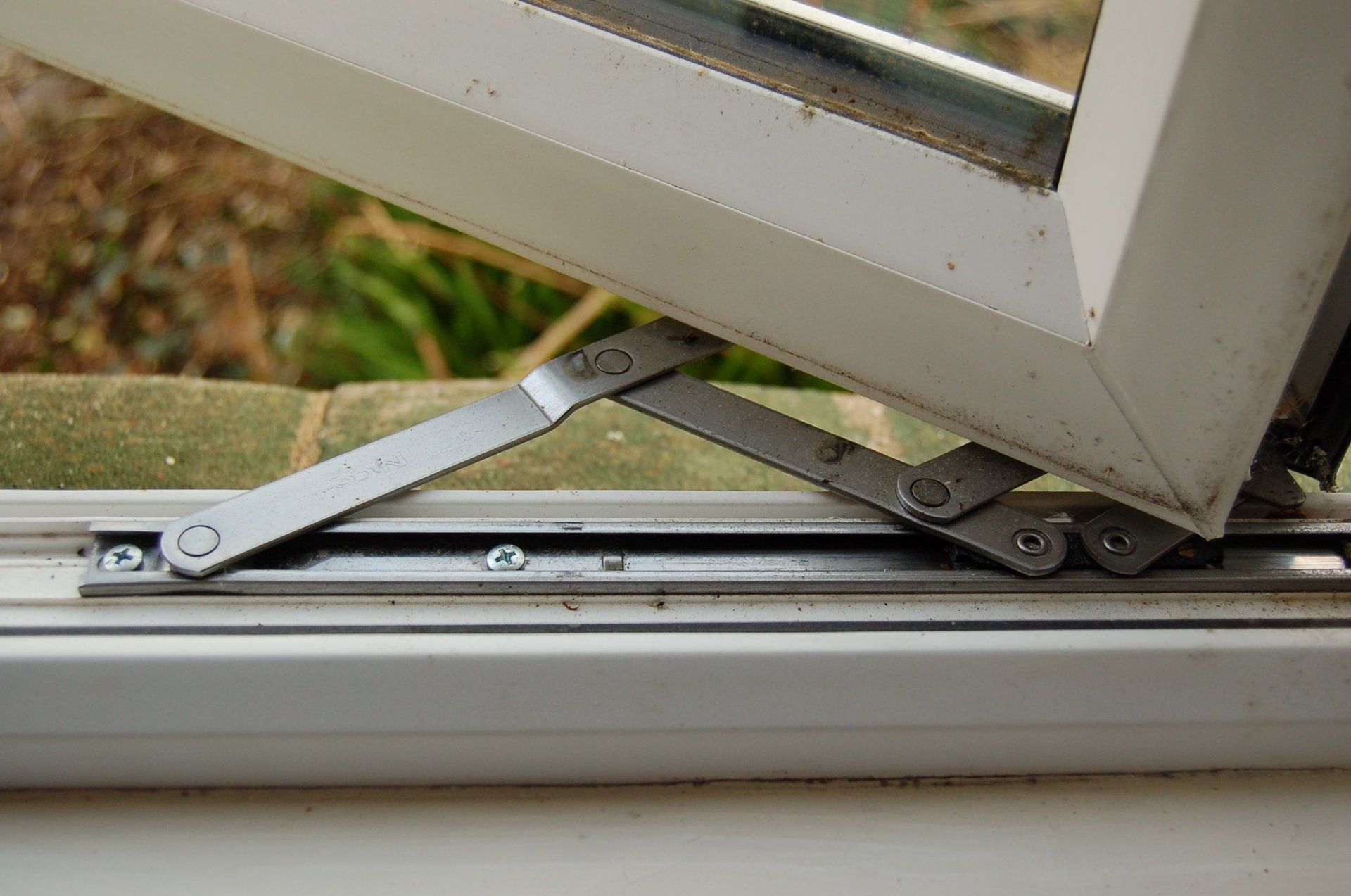 CJ Locksmiths friction hinges repaired on upvc windows