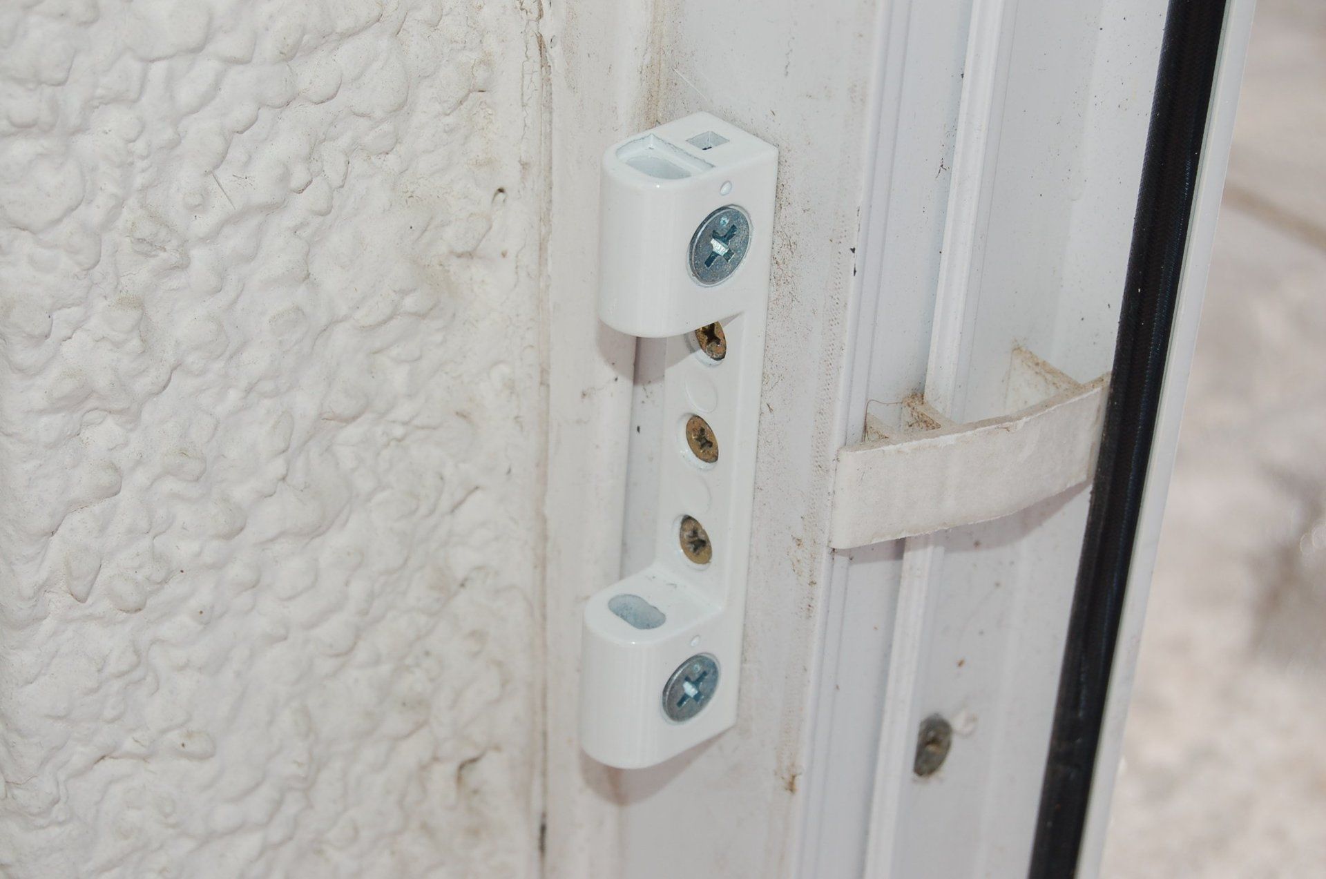 upvc door hinge repairs re-postion new hinge cj locksmiths