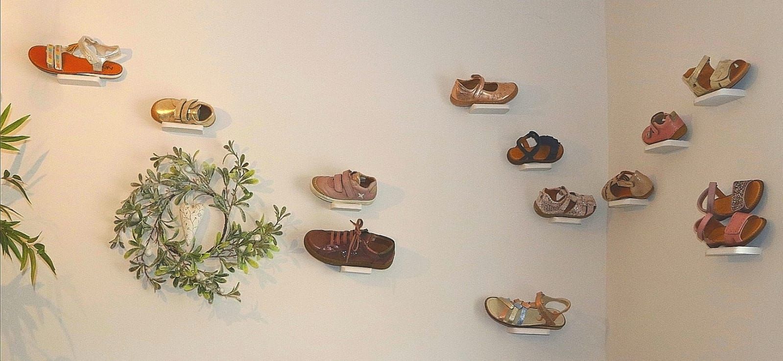 room with shoes on wall