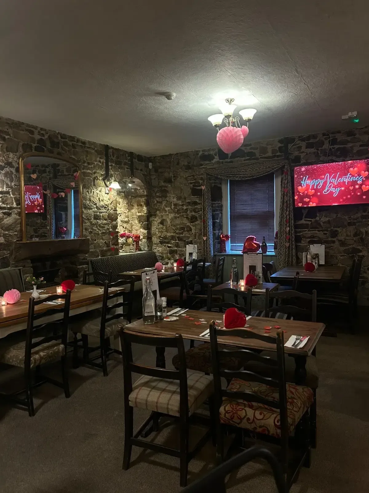 The Mackworth Arms, Laleston, Bridgend | Restaurant interior decorated for Valentine's Day. 