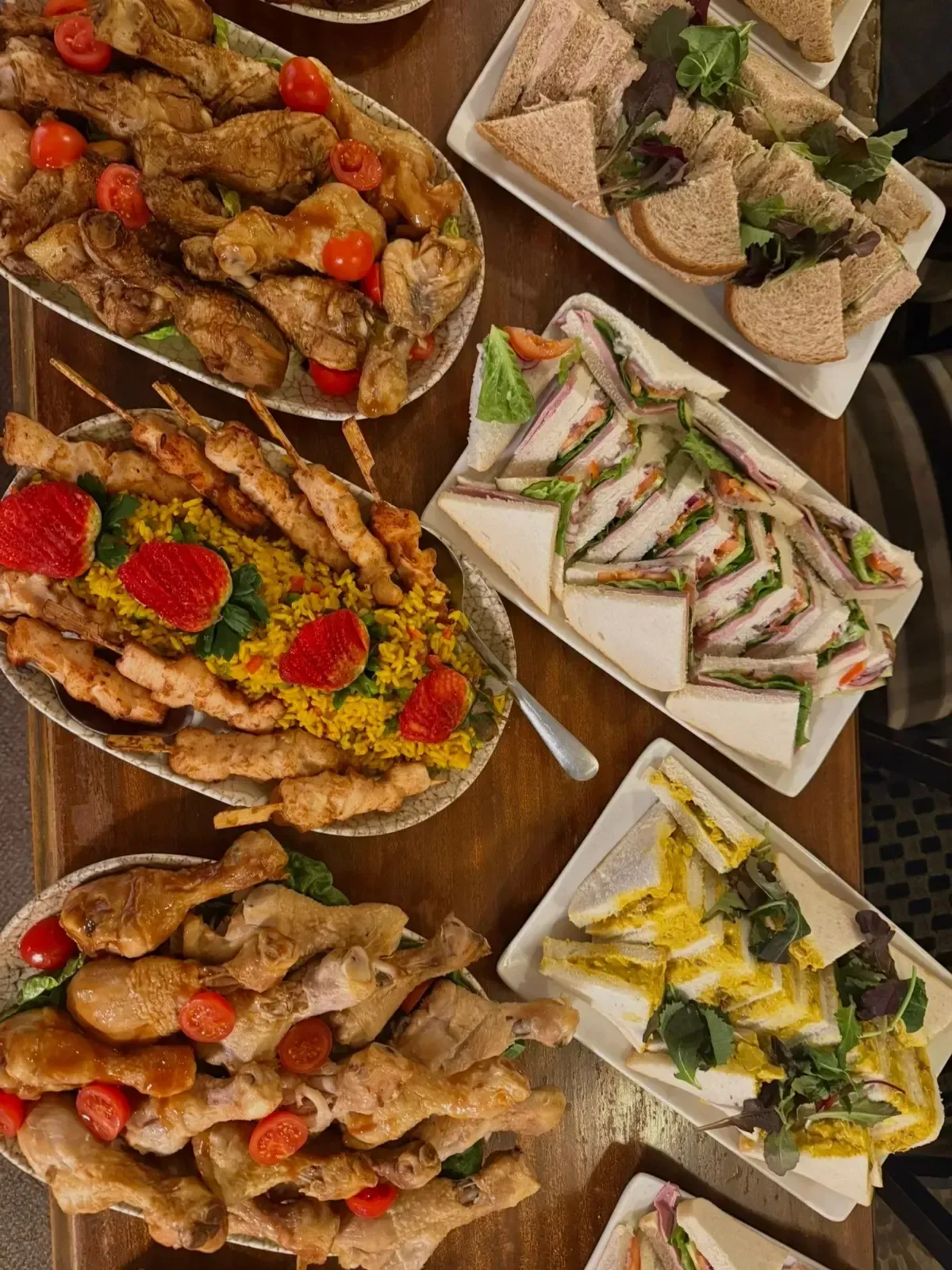 The Mackworth Arms, Laleston, Bridgend | Platters of food: chicken drumsticks, skewers with rice, and sandwiches