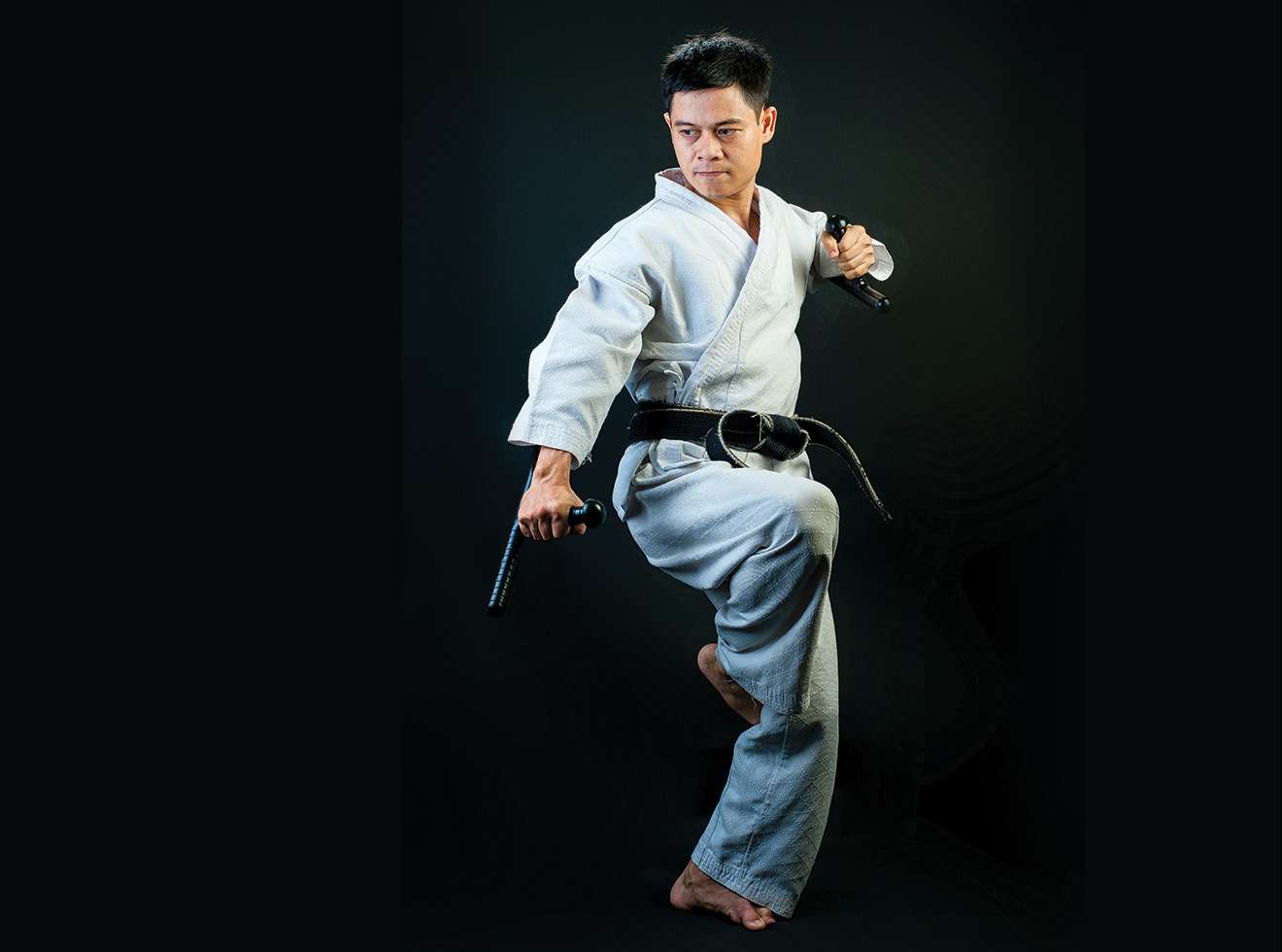karate  teacher with weapon