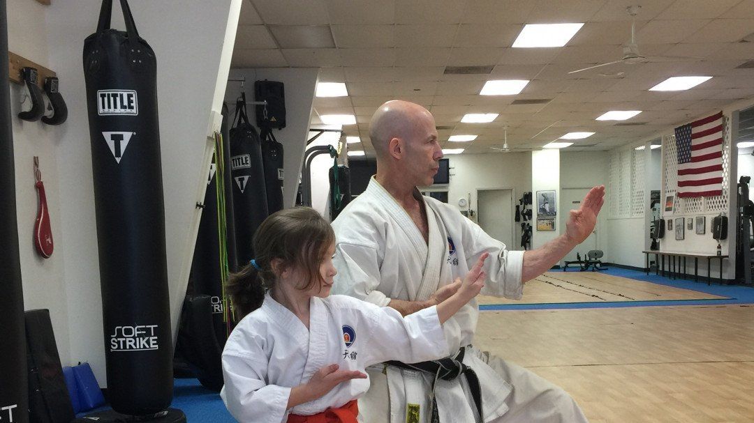 karate teacher and student