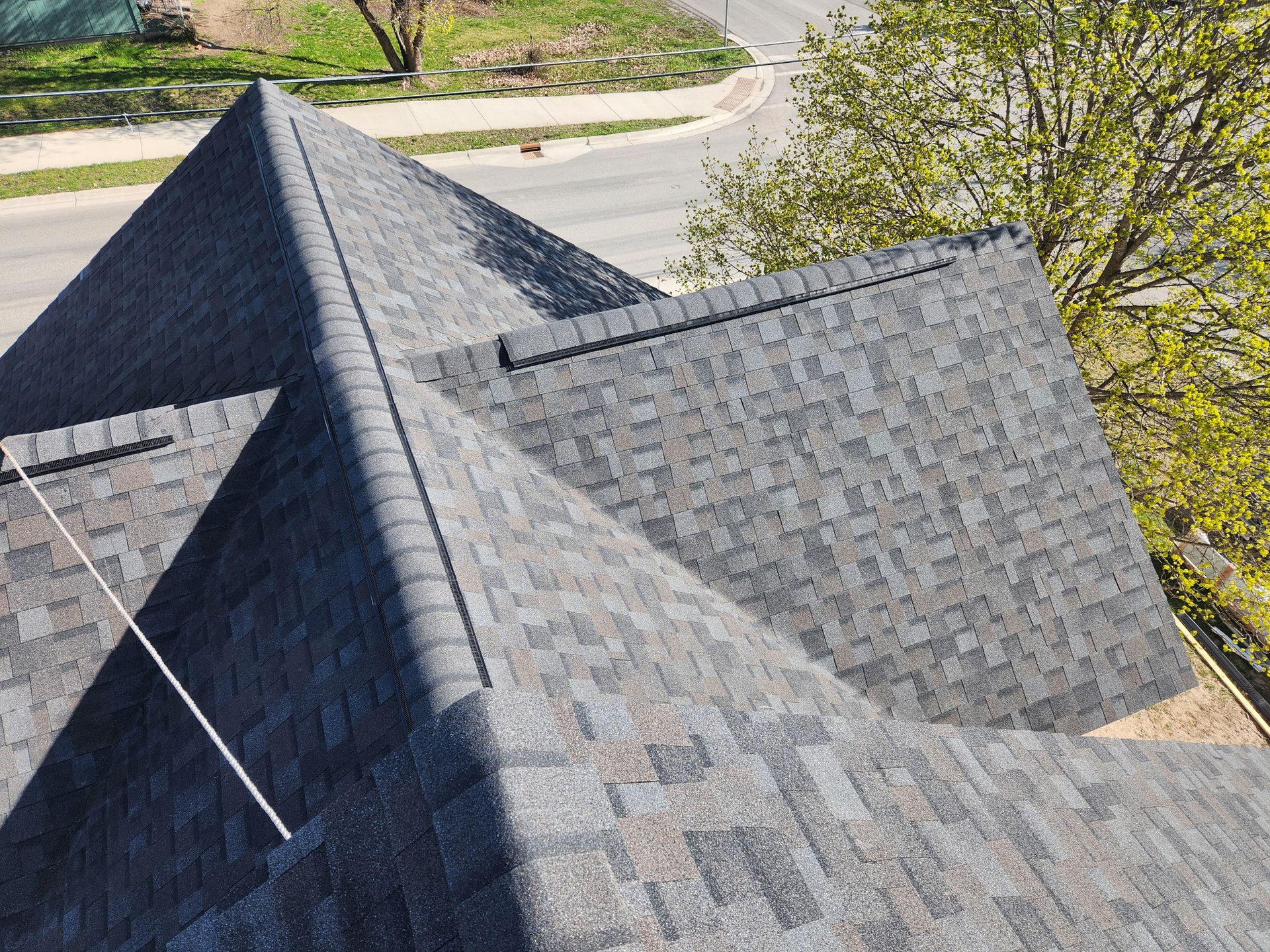 An aerial view of a roof with a pyramid shaped roof.