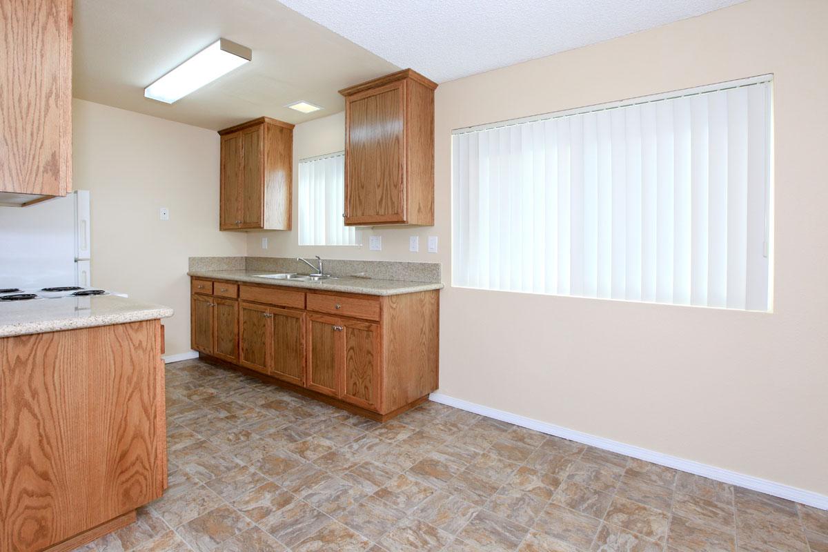 Kitchen with open dining area next to it.
