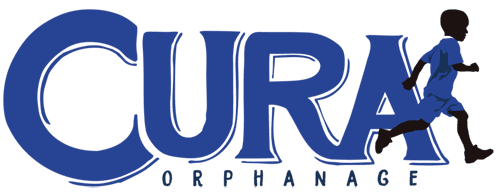A blue logo for cura orphanage with a silhouette of a child running