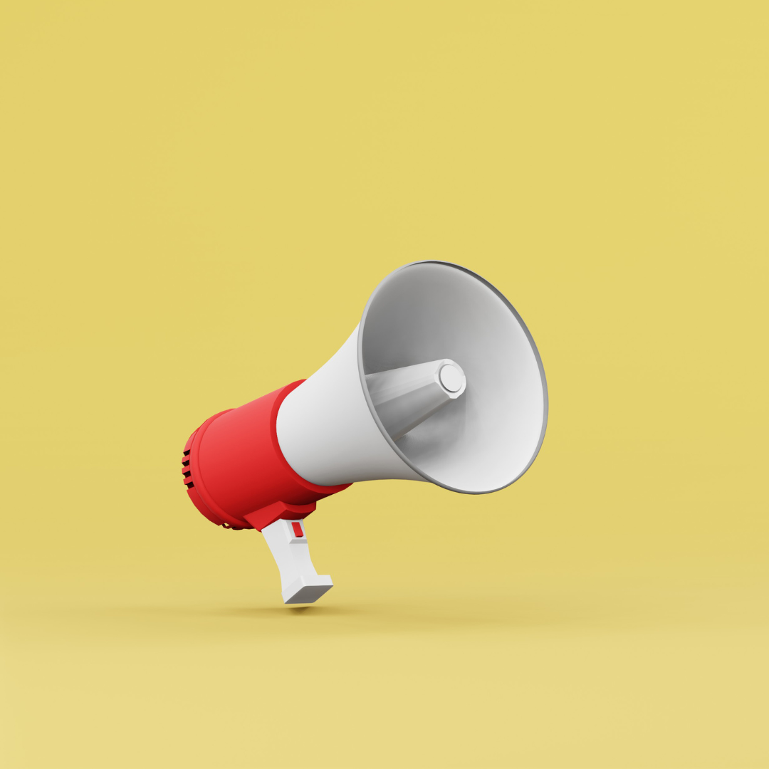 A red and white megaphone on a yellow background.