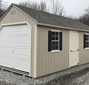 A garage with a garage door and a window.