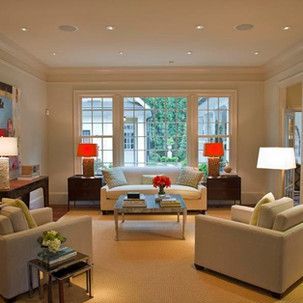 A living room filled with furniture and a couch.