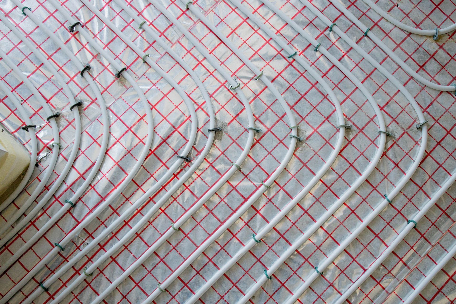 A close up of a underfloor heating system on a floor.